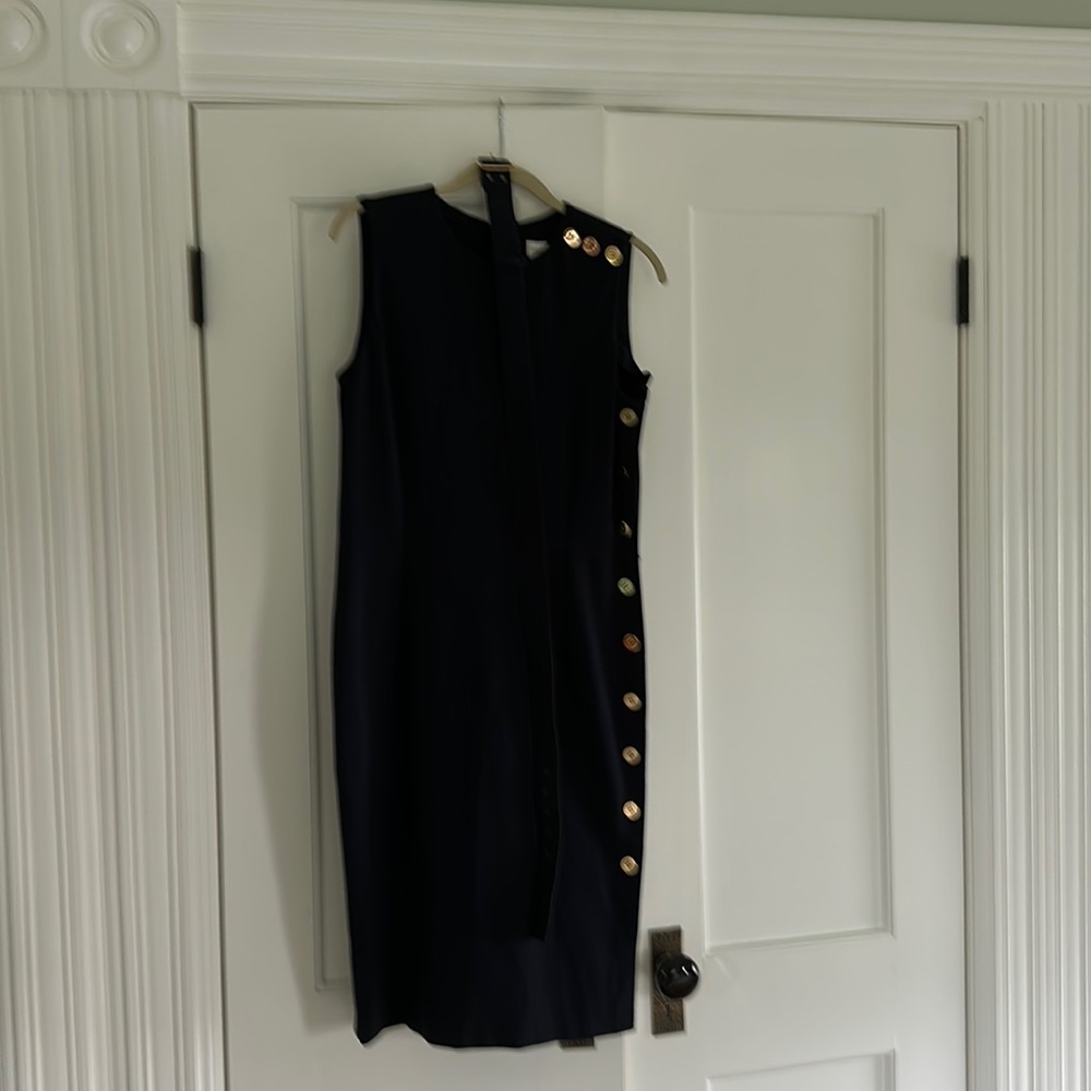 Navy dress with button details and matching belt